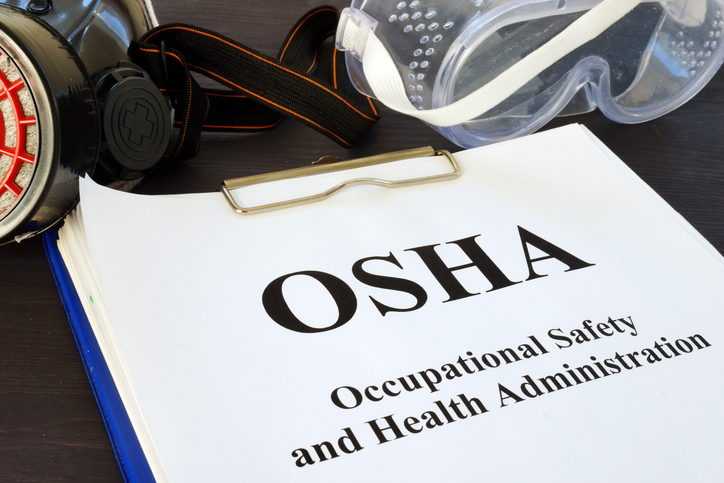 Photo of a clipboard reading "OSHA: Occupational Safety and Health Administration"