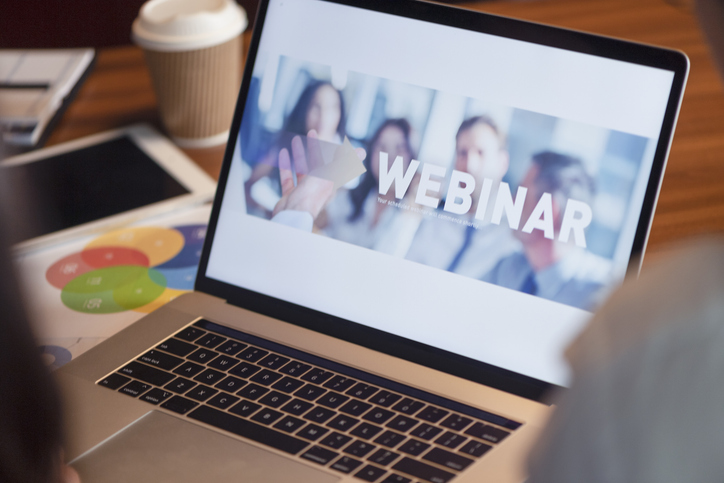 Photo of a webinar on a laptop screen.