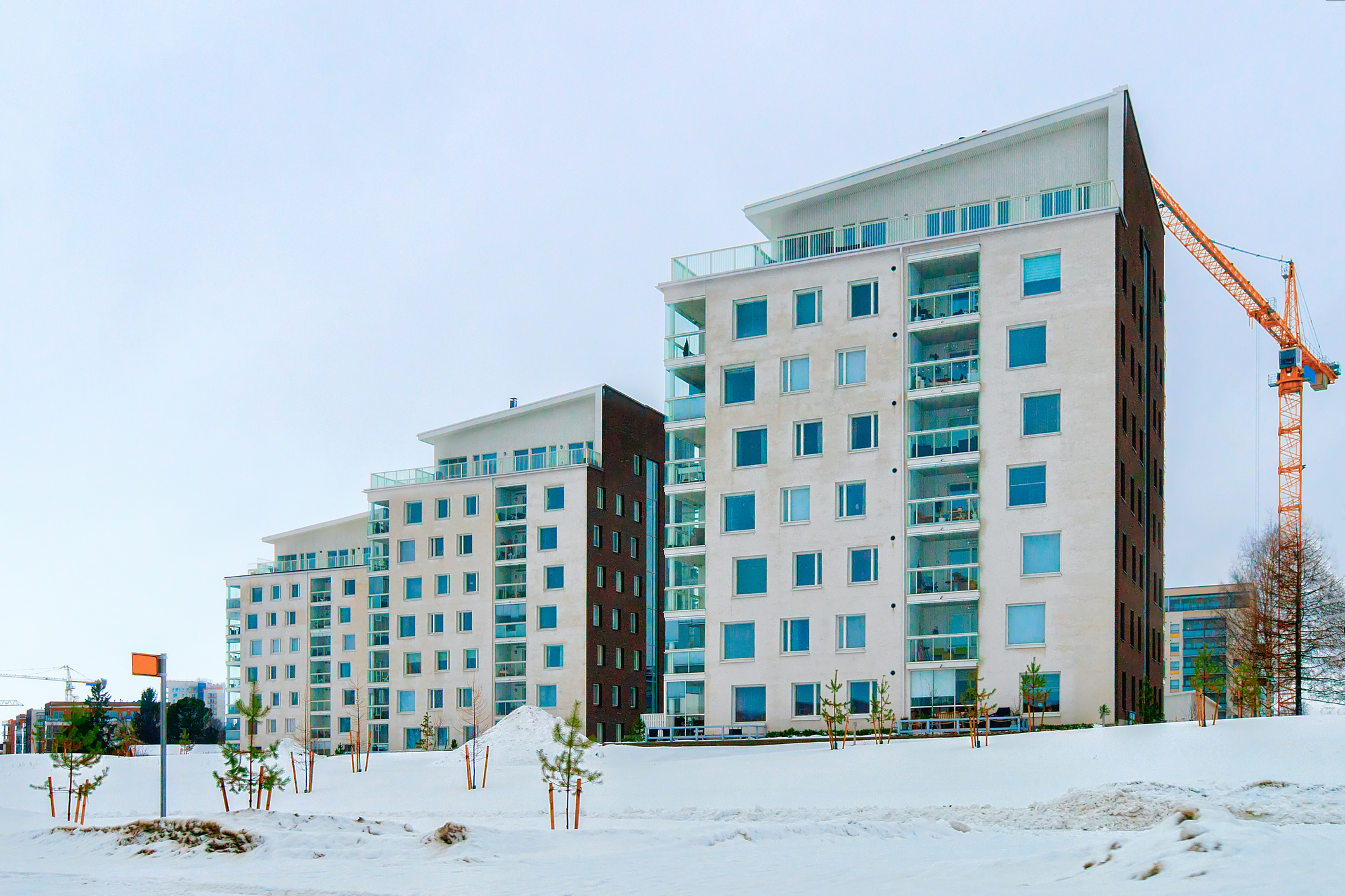 apartment building being built in winter