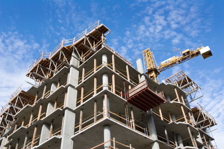 Photo of an apartment community under construction.