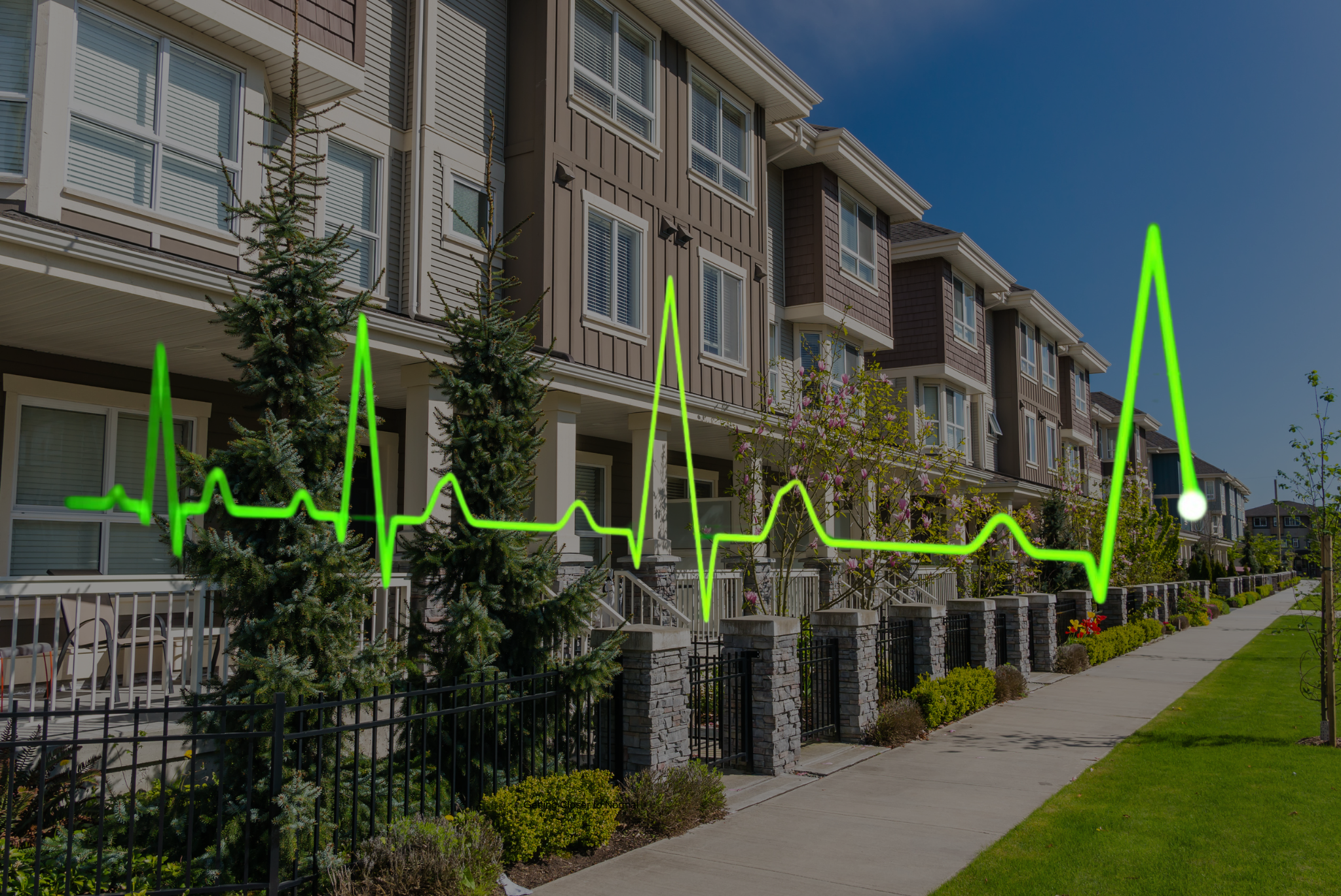 apartment exterior with heart monitor graph overlaid