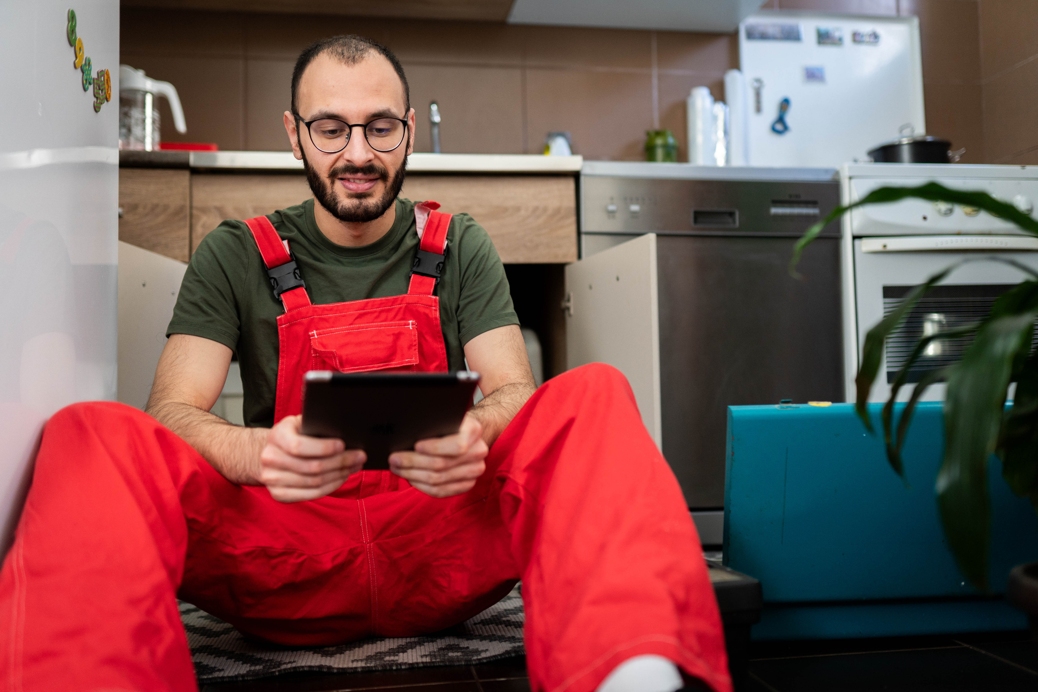 maintenance tech looking at ipad