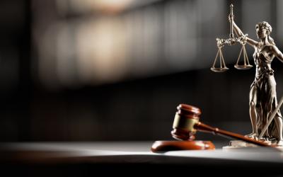Photo of a Court gavel and scales of justice.