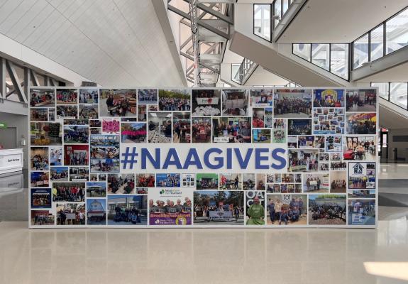 Photo of the 2023 #NAAGives Wall, NAA's annual charitable giving display at Apartmentalize.
