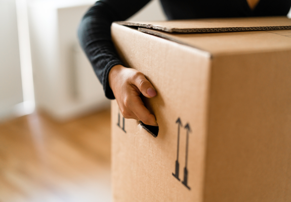 person holding a box