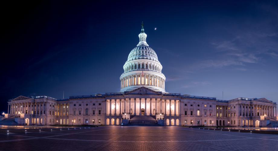 Panoramic view of the U.S. Capitol at night.