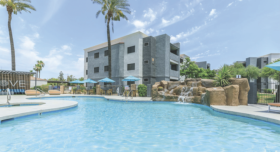 Pool side and apartment building 