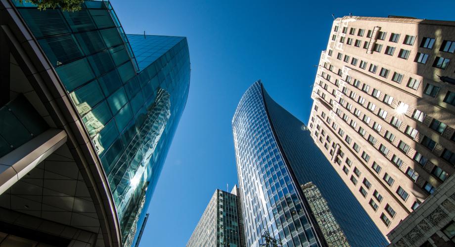 skyscrapers with blue sky behind them