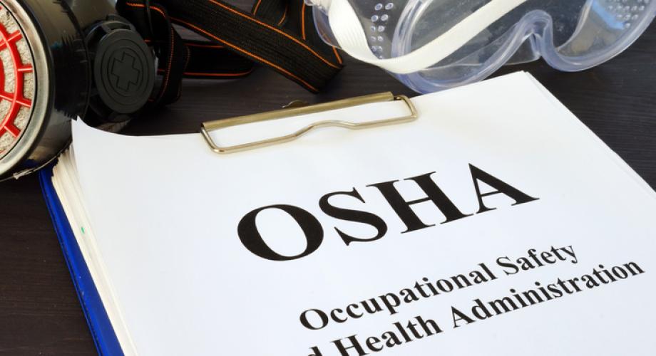 Photo of a clipboard reading "OSHA: Occupational Safety and Health Administration"