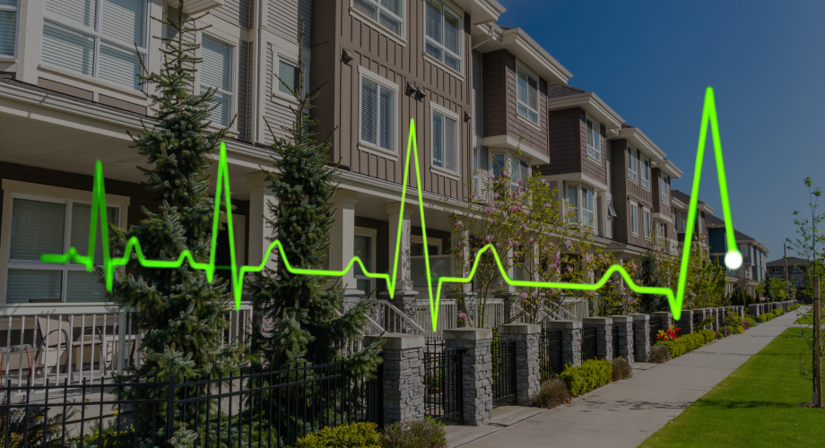 apartment exterior with heart monitor graph overlaid