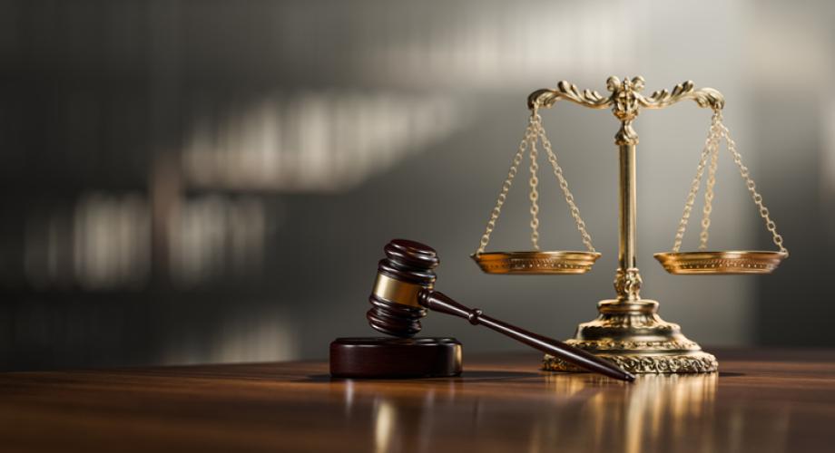 Photo of a gavel and scales of justice.