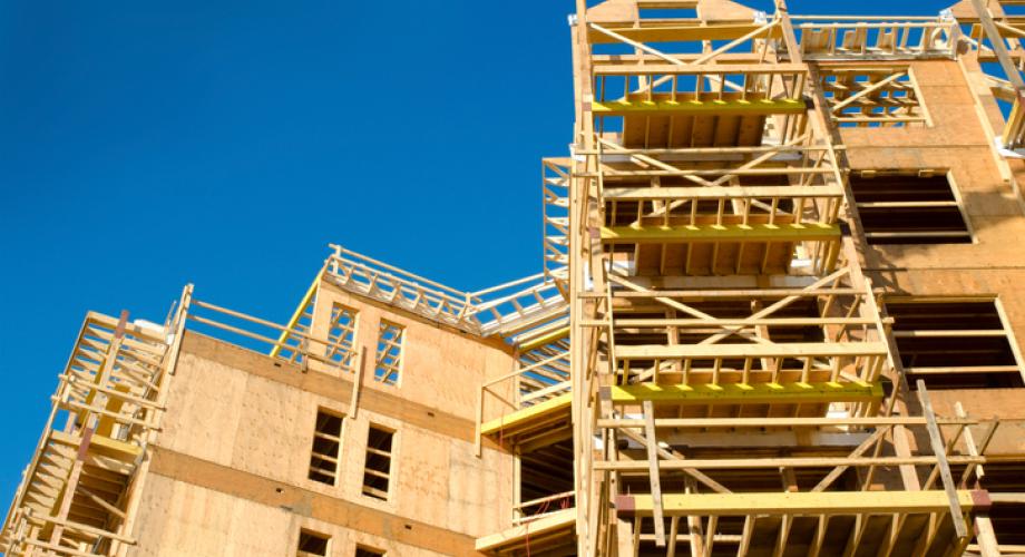 Photo of an apartment community under construction.