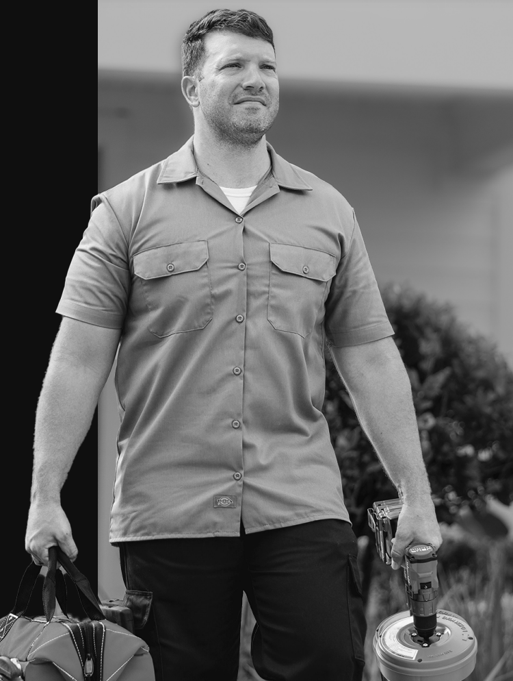man carrying maintenance tools