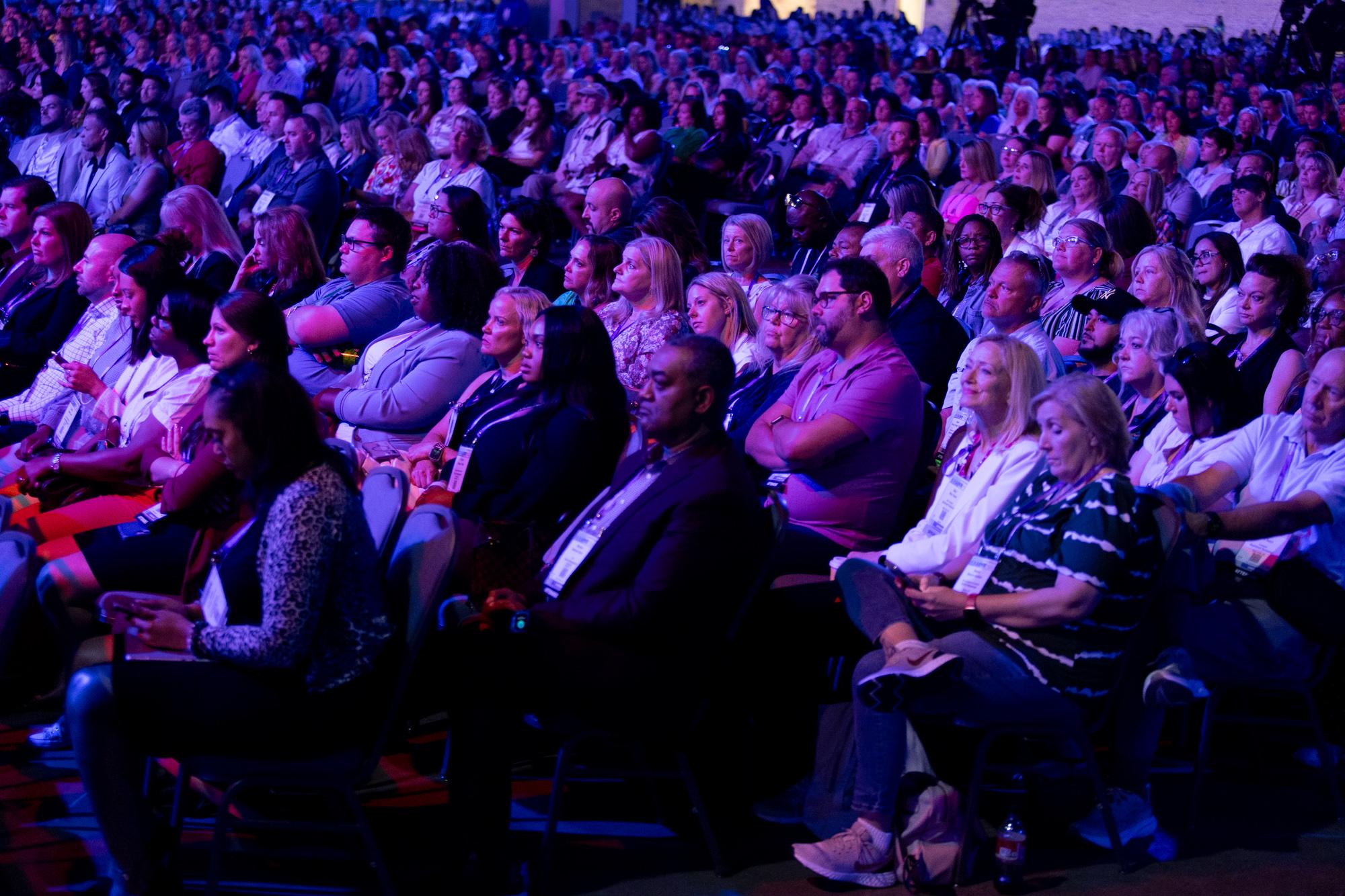 Apartmentalize attendees listen intently to Medal of Honor recipient Kyle Carpenter, Day 2 General Session Keynote Speaker.