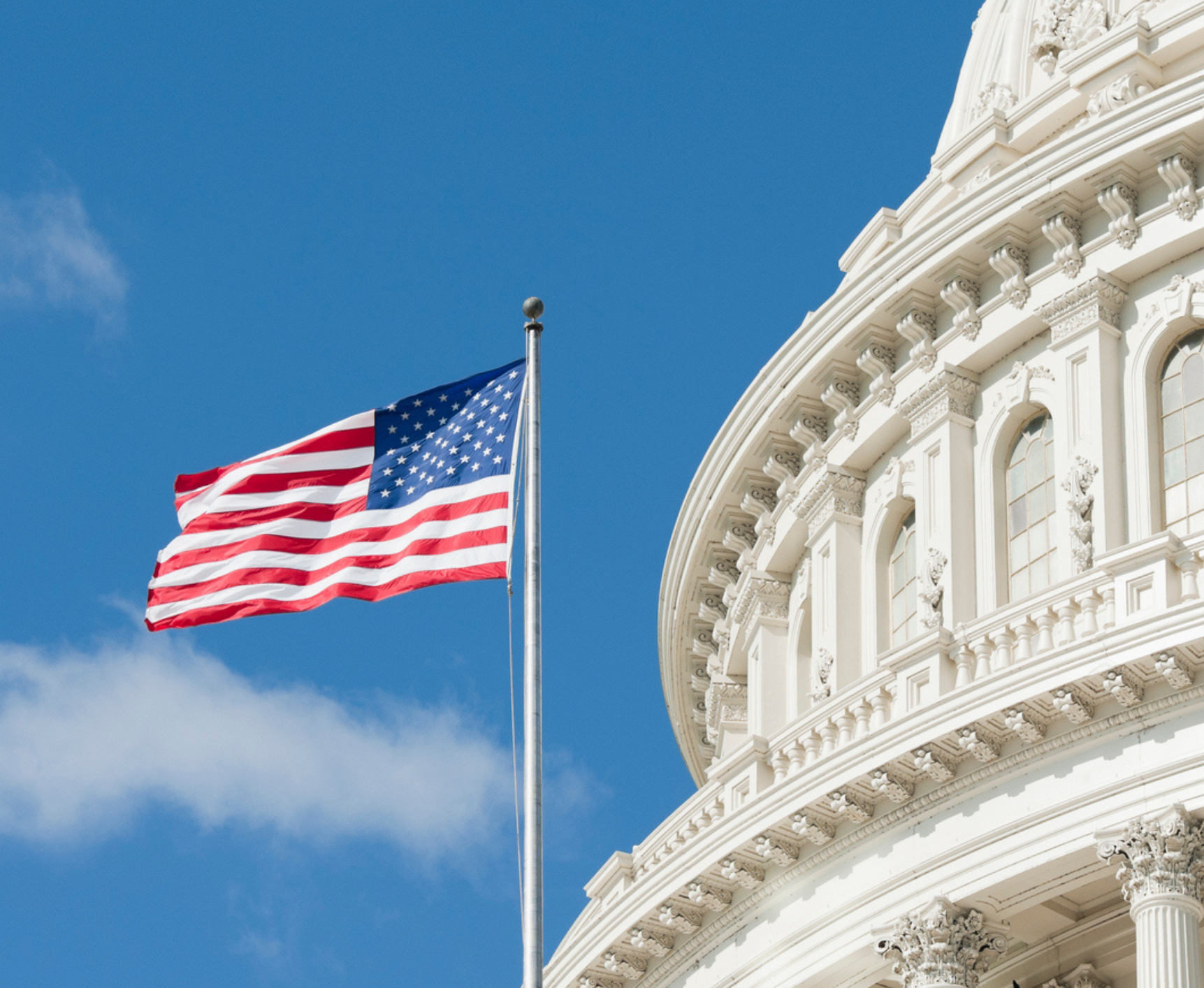 american flag at US capitol building