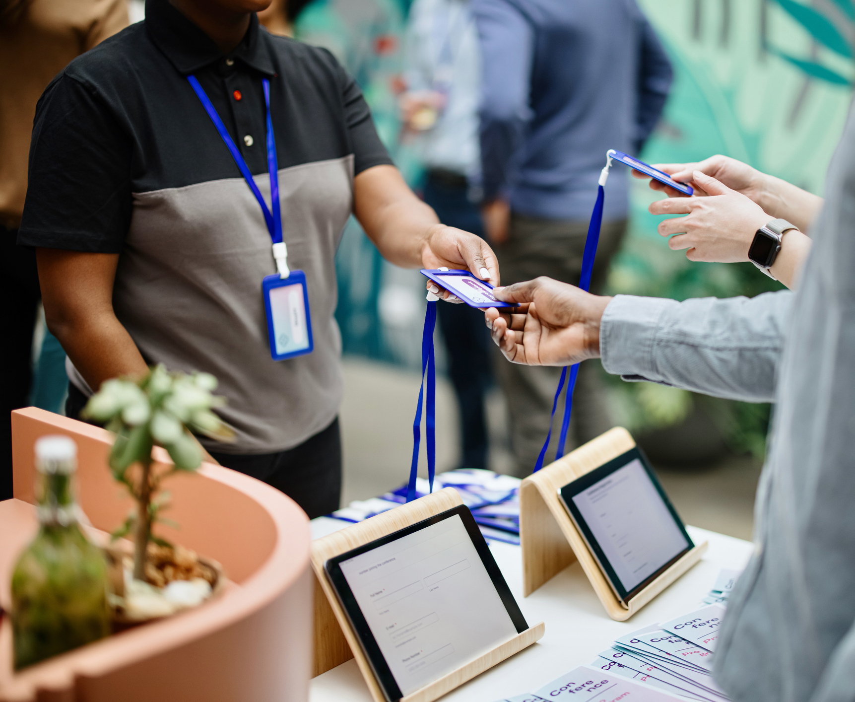 attendee at an event getting their badge